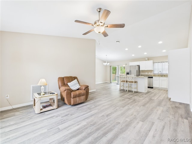 178 W Navarro Pl, Citrus Springs, FL 34434 - sitting room featuring light wood-style flooring, recessed lighting, a chandelier, a ceiling fan, and baseboards