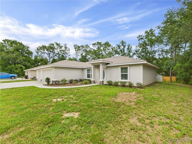 178 W Navarro Pl, Citrus Springs, FL 34434 - single story home featuring concrete driveway, an attached garage, and stucco siding