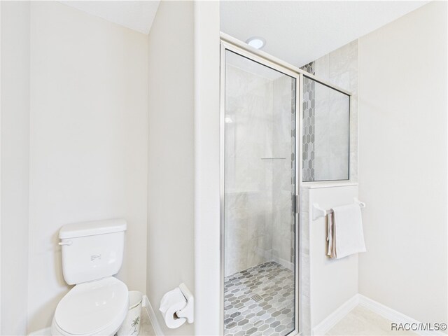 178 W Navarro Pl, Citrus Springs, FL 34434 - full bathroom featuring toilet, a stall shower, and baseboards