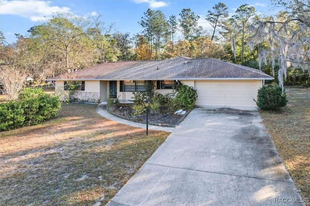 ranch-style house with a garage