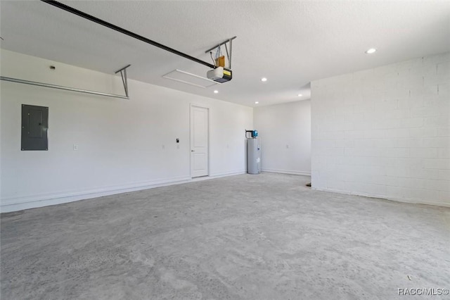 garage featuring a garage door opener, electric panel, and electric water heater