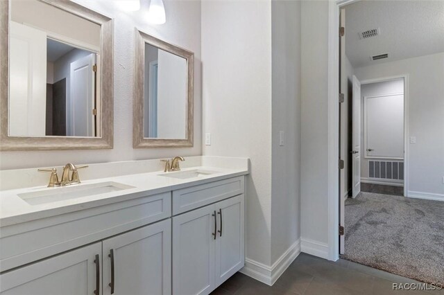 bathroom featuring vanity and tile patterned floors