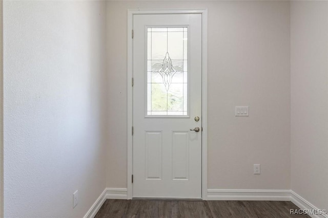 entryway with dark hardwood / wood-style floors