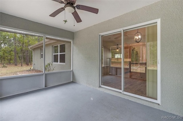17 Eugenia Ct, Homosassa, FL 34446 - unfurnished sunroom featuring ceiling fan