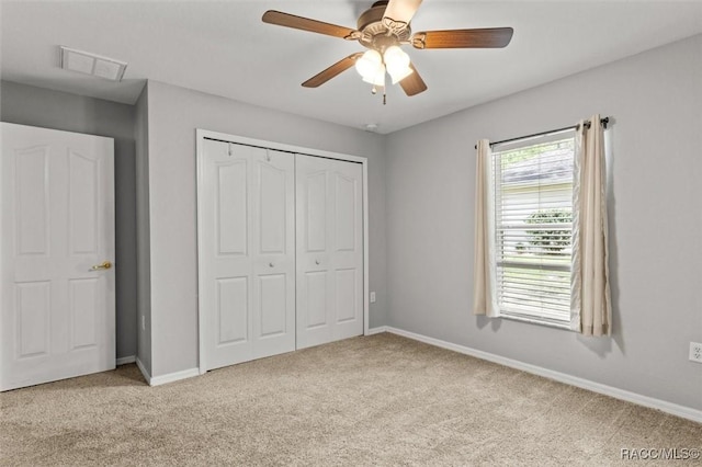 17 Eugenia Ct, Homosassa, FL 34446 - unfurnished bedroom featuring ceiling fan, a closet, visible vents, carpet flooring, and baseboards