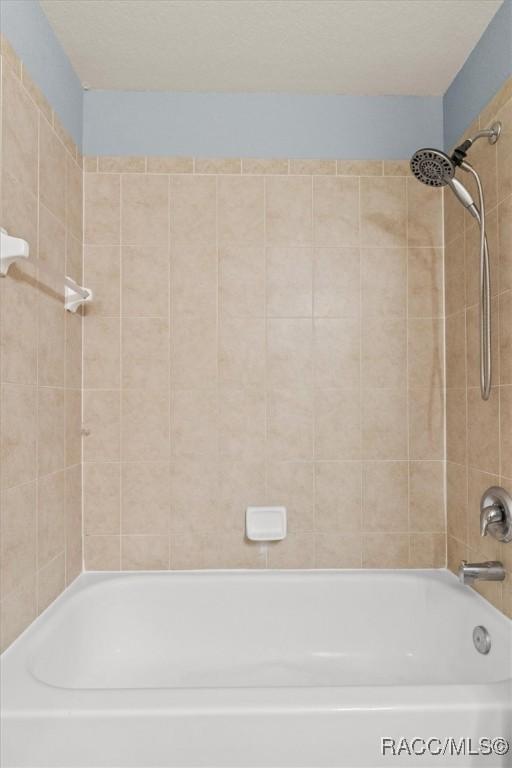 17 Eugenia Ct, Homosassa, FL 34446 - full bathroom featuring bathing tub / shower combination