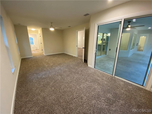 carpeted empty room with ceiling fan