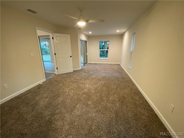 unfurnished room featuring carpet floors and ceiling fan