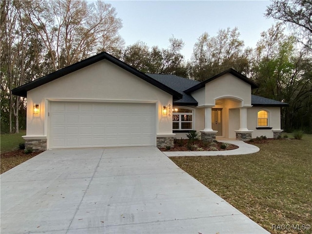 view of front of property featuring a garage