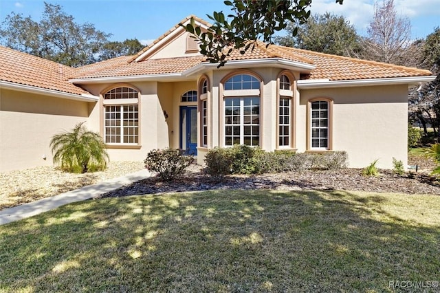 exterior space with a front yard