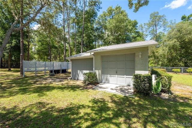 1212 W Redding St, Hernando, FL 34442 - detached garage with view of scattered trees