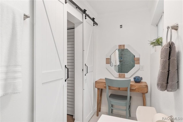 2310 N Watersedge Dr, Crystal River, FL 34429 - bathroom with crown molding and toilet
