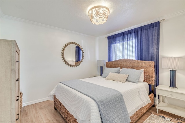 2310 N Watersedge Dr, Crystal River, FL 34429 - bedroom featuring wood finished floors, crown molding, and a chandelier