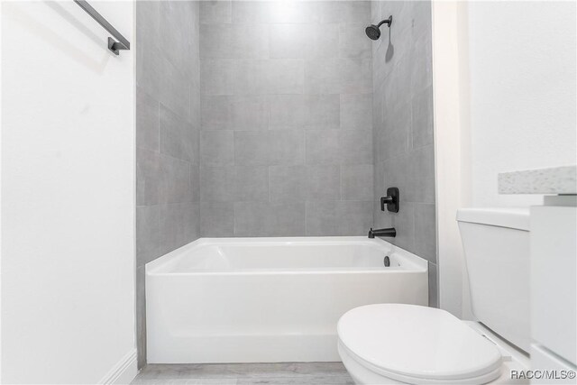 8589 N Sumter Ter, Dunnellon, FL 34433 - full bath featuring bathtub / shower combination and wood finished floors