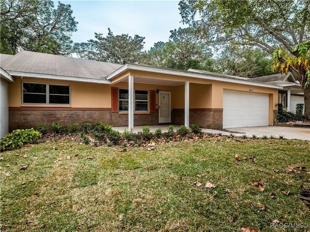 ranch-style house featuring a garage and a front yard