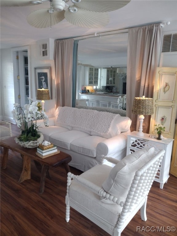 living room with dark wood-type flooring