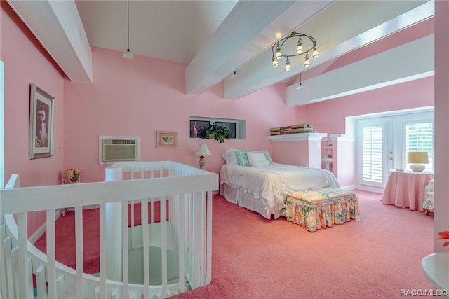 carpeted bedroom featuring beamed ceiling, french doors, and a wall mounted AC