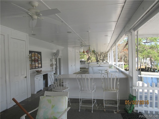 view of patio / terrace featuring ceiling fan