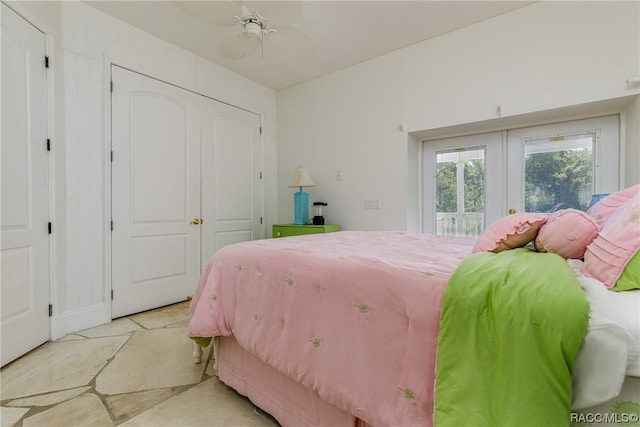 bedroom with a closet, ceiling fan, french doors, and access to exterior