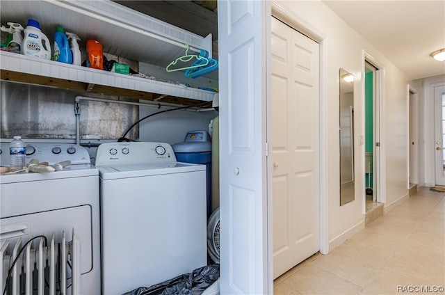 washroom with light tile patterned floors