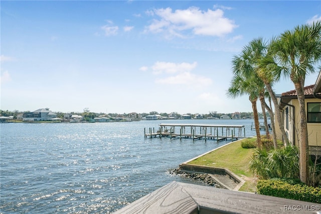 view of dock featuring a water view and boat lift