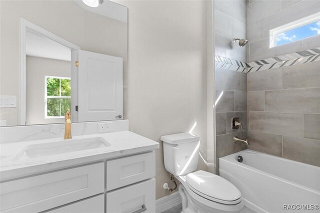 kitchen with white cabinetry, a kitchen island with sink, light wood-type flooring, and appliances with stainless steel finishes