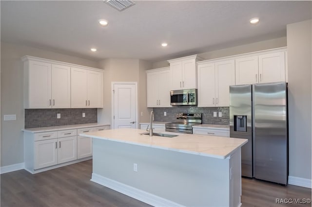 kitchen featuring white cabinetry, appliances with stainless steel finishes, and sink