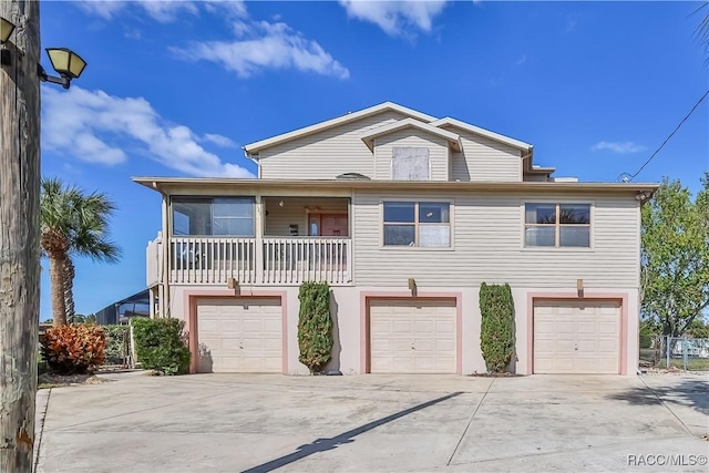 front of property with a garage