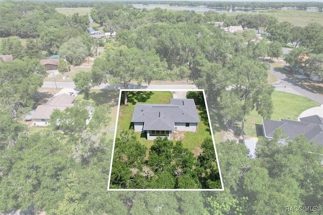1009 S Maplenut Way, Inverness, FL 34450 - aerial view of property and surrounding area featuring property boundaries highlighted