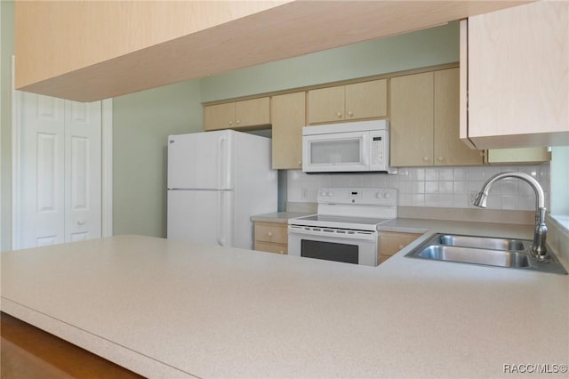 3570 E Cove Park Trl, Hernando, FL 34442 - kitchen featuring white appliances, a sink, light brown cabinetry, light countertops, and decorative backsplash