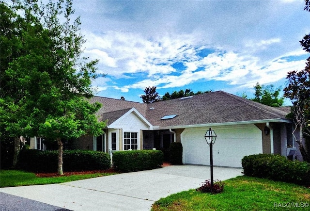 6102 W Fairdale Ct, Crystal River, FL 34429 - ranch-style home with concrete driveway, a garage, and a shingled roof