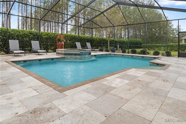 view of swimming pool with a patio, a lanai, and a pool with connected hot tub