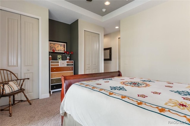 bedroom with light colored carpet