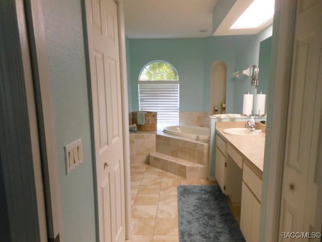 141 W Forest Oak Pl, Beverly Hills, FL 34465 - full bath featuring vanity, a bath, and tile patterned flooring