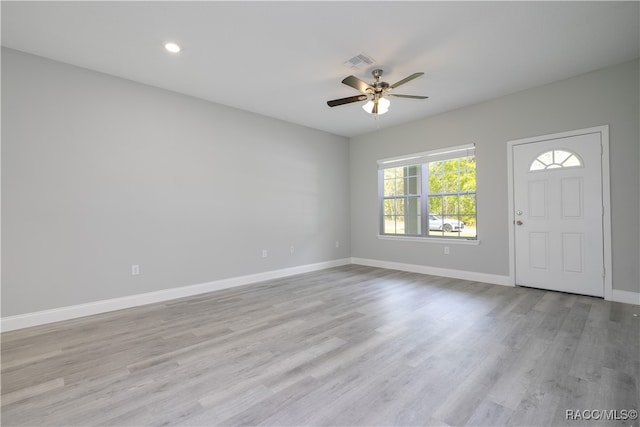 entrance foyer with ceiling fan and light hardwood / wood-style floors