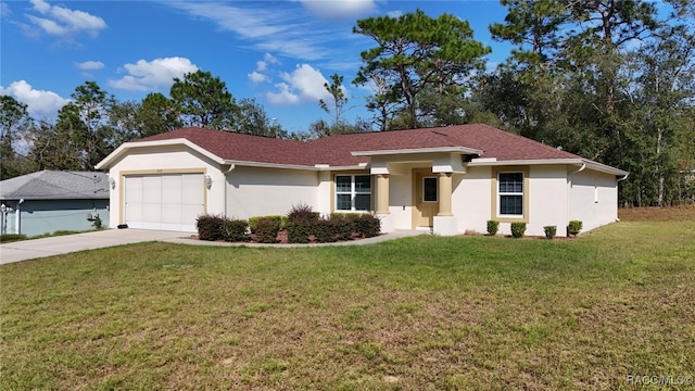 single story home with a garage and a front lawn