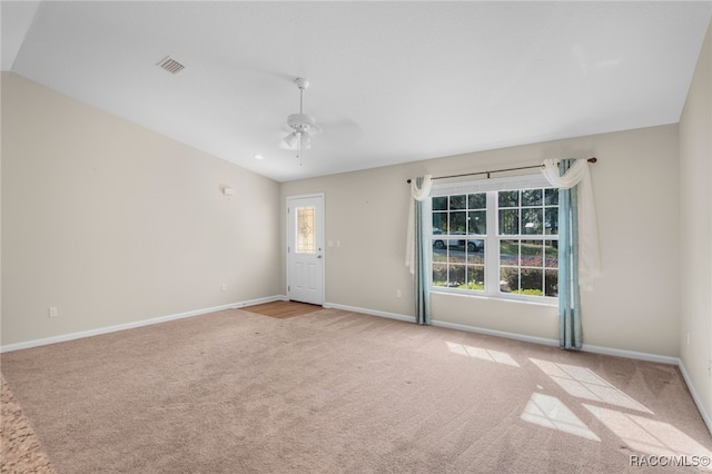 unfurnished room with light carpet, ceiling fan, and a healthy amount of sunlight