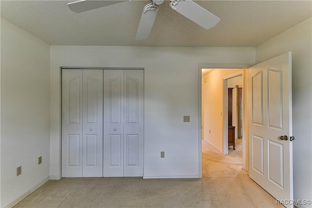 5618 W Hesse Ct, Homosassa, FL 34448 - unfurnished bedroom with light carpet, a textured ceiling, and baseboards