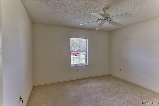 5618 W Hesse Ct, Homosassa, FL 34448 - spare room featuring light carpet, a textured ceiling, and a ceiling fan