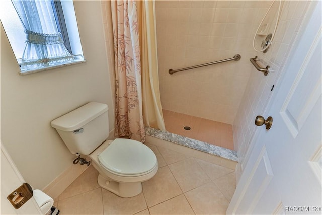 5618 W Hesse Ct, Homosassa, FL 34448 - bathroom with toilet, a shower stall, and tile patterned floors
