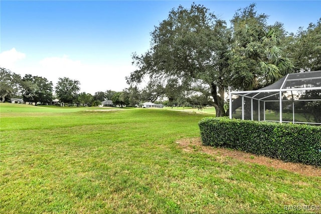 640 E Hartford St, Hernando, FL 34442 - view of green lawn with a lanai