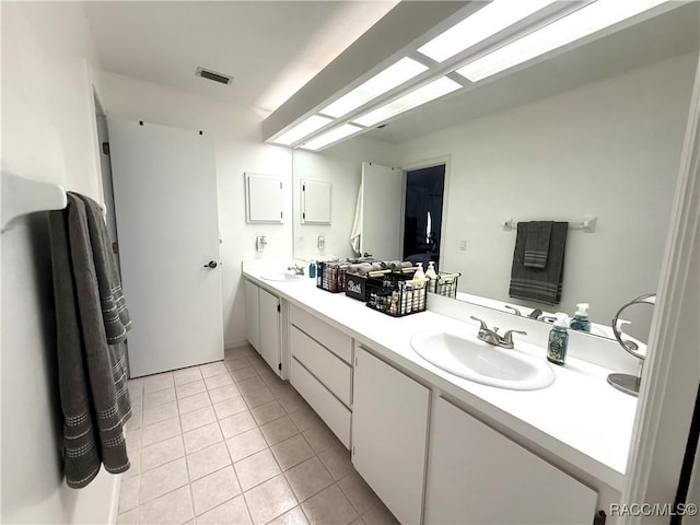 640 E Hartford St, Hernando, FL 34442 - full bathroom featuring double vanity and tile patterned flooring