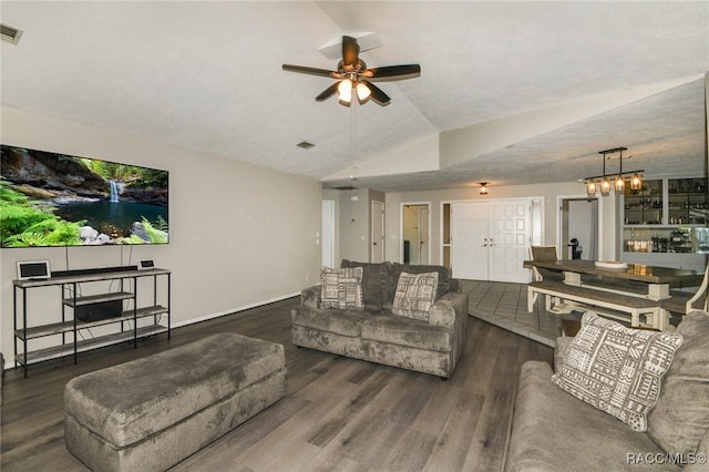 640 E Hartford St, Hernando, FL 34442 - living room with vaulted ceiling, wood finished floors, ceiling fan, and a chandelier