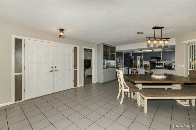 640 E Hartford St, Hernando, FL 34442 - dining space with light tile patterned flooring and baseboards