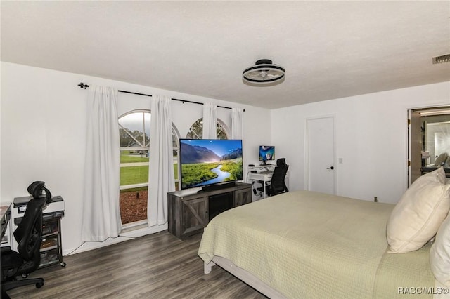 640 E Hartford St, Hernando, FL 34442 - bedroom featuring a desk, wood finished floors, and access to exterior