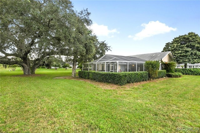 640 E Hartford St, Hernando, FL 34442 - view of green lawn featuring glass enclosure