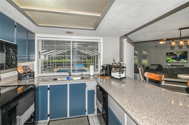 640 E Hartford St, Hernando, FL 34442 - kitchen featuring blue cabinetry, black appliances, a textured ceiling, tile patterned flooring, and light stone counters