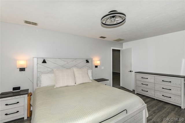 640 E Hartford St, Hernando, FL 34442 - bedroom with dark wood-style flooring