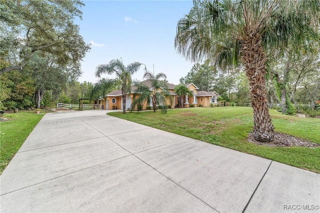 view of front of house with a front lawn