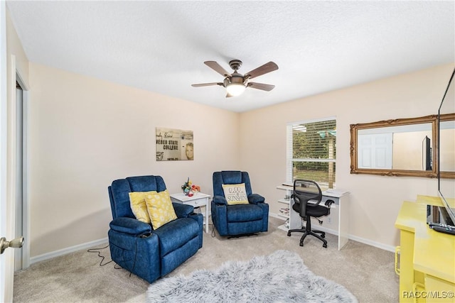 sitting room with light carpet and ceiling fan